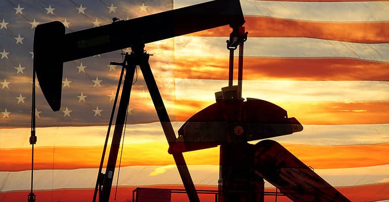 Image of an oil pump and the US flag